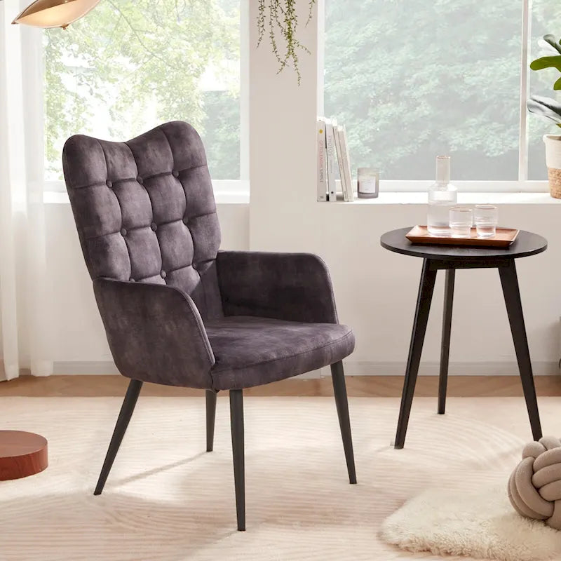 Fauteuil d'appoint à dossier haut, dossier capitonné et accoudoirs ailés
