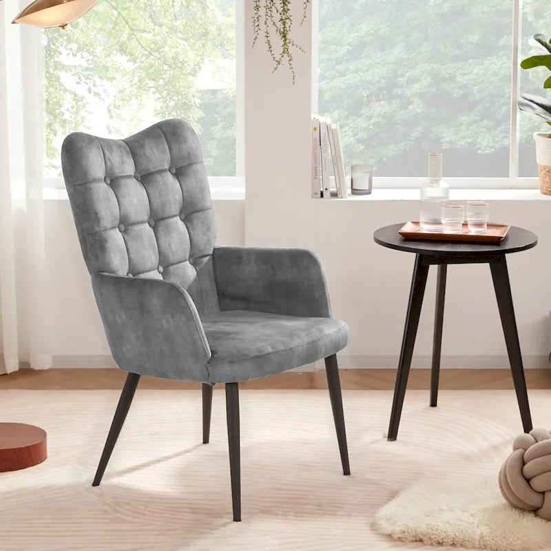 Fauteuil d'appoint à dossier haut, dossier capitonné et accoudoirs ailés