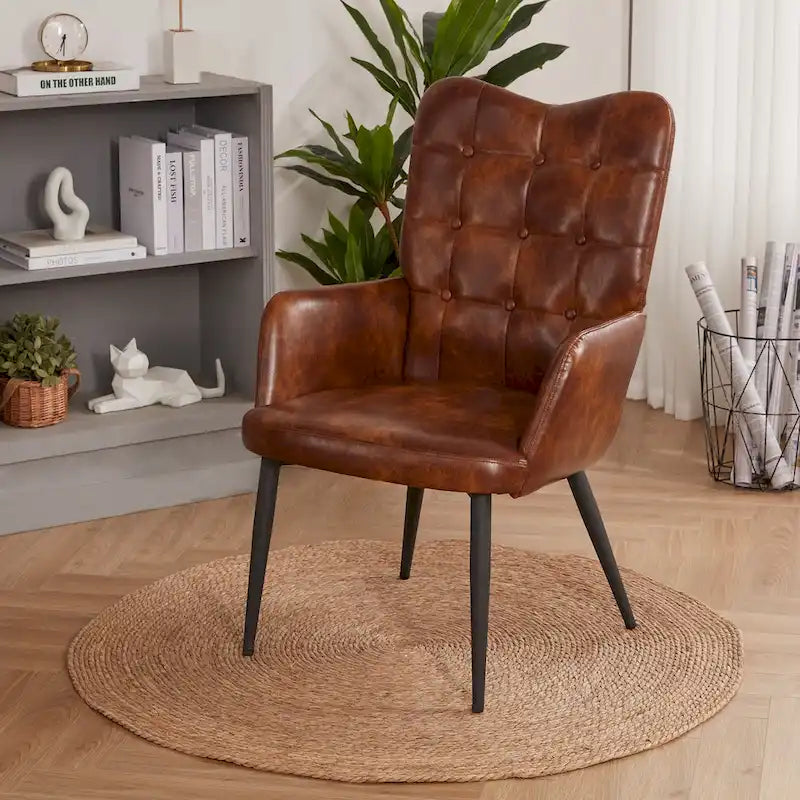 Fauteuil d'appoint à dossier haut, dossier capitonné et accoudoirs ailés