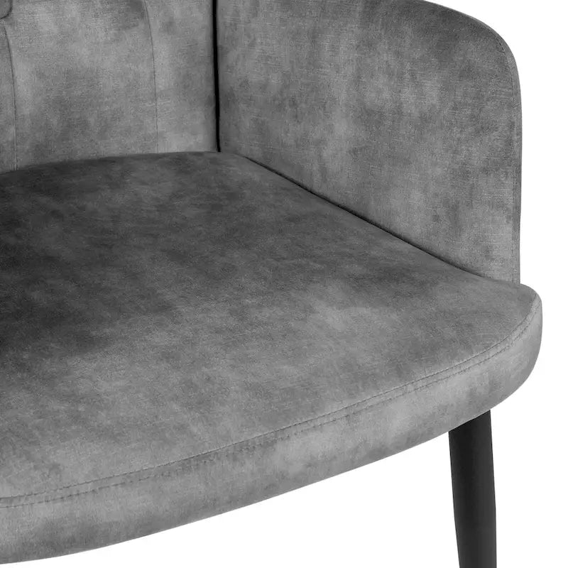Fauteuil d'appoint à dossier haut, dossier capitonné et accoudoirs ailés