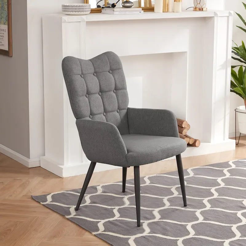 Fauteuil d'appoint à dossier haut, dossier capitonné et accoudoirs ailés