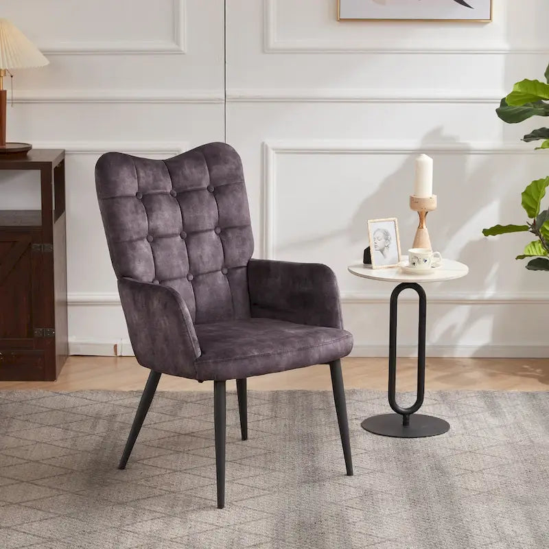 Fauteuil d'appoint à dossier haut, dossier capitonné et accoudoirs ailés