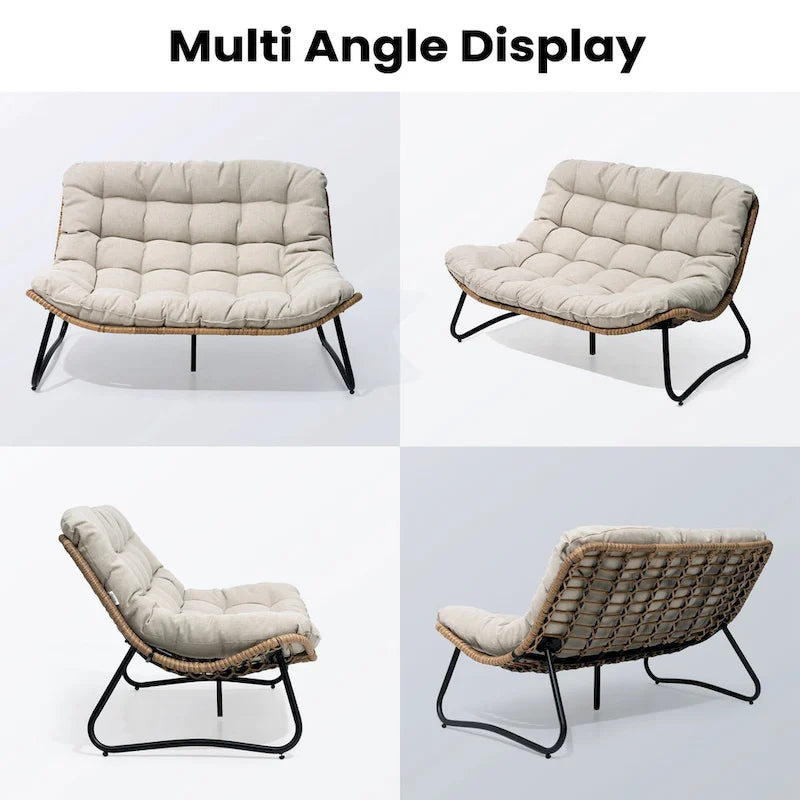 Ce fauteuil double en rotin est livré avec un coussin et convient aussi bien à une utilisation intérieure qu'extérieure.